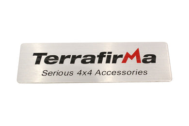 TERRAFIRMA METAL BADGE: SELF ADHESIVE